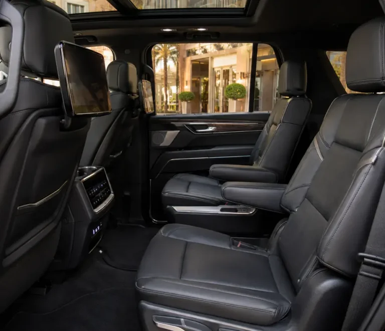 Luxury Cadillac Escalade rear seats for weekly car rental with driver in Dubai